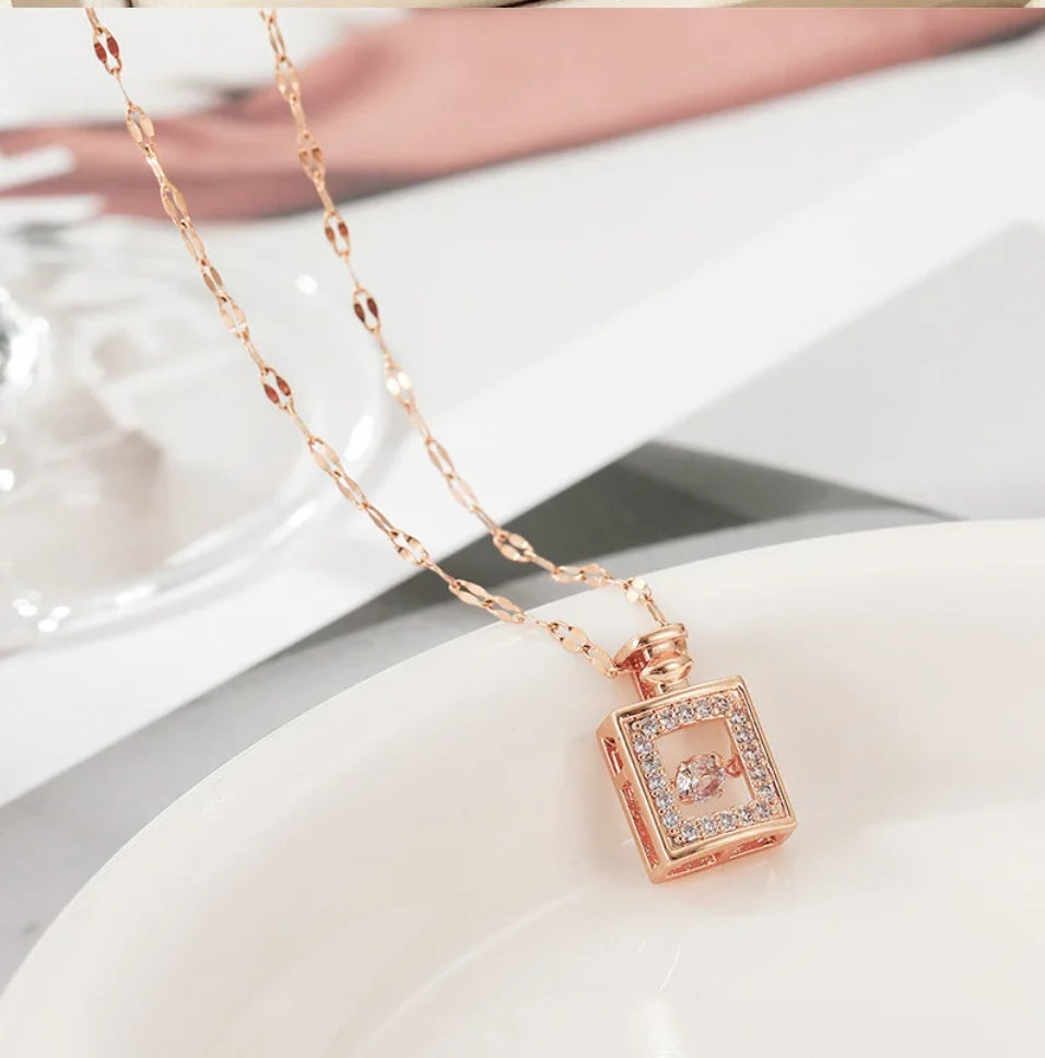 Dancing Diamond Perfume Bottle Shape Pendant With Chain - Rose Gold