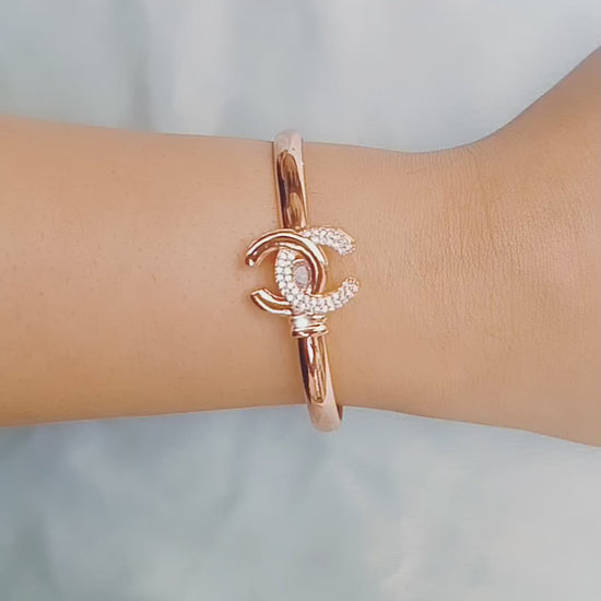 Crystal-embellished bangle bracelets in rose gold finish