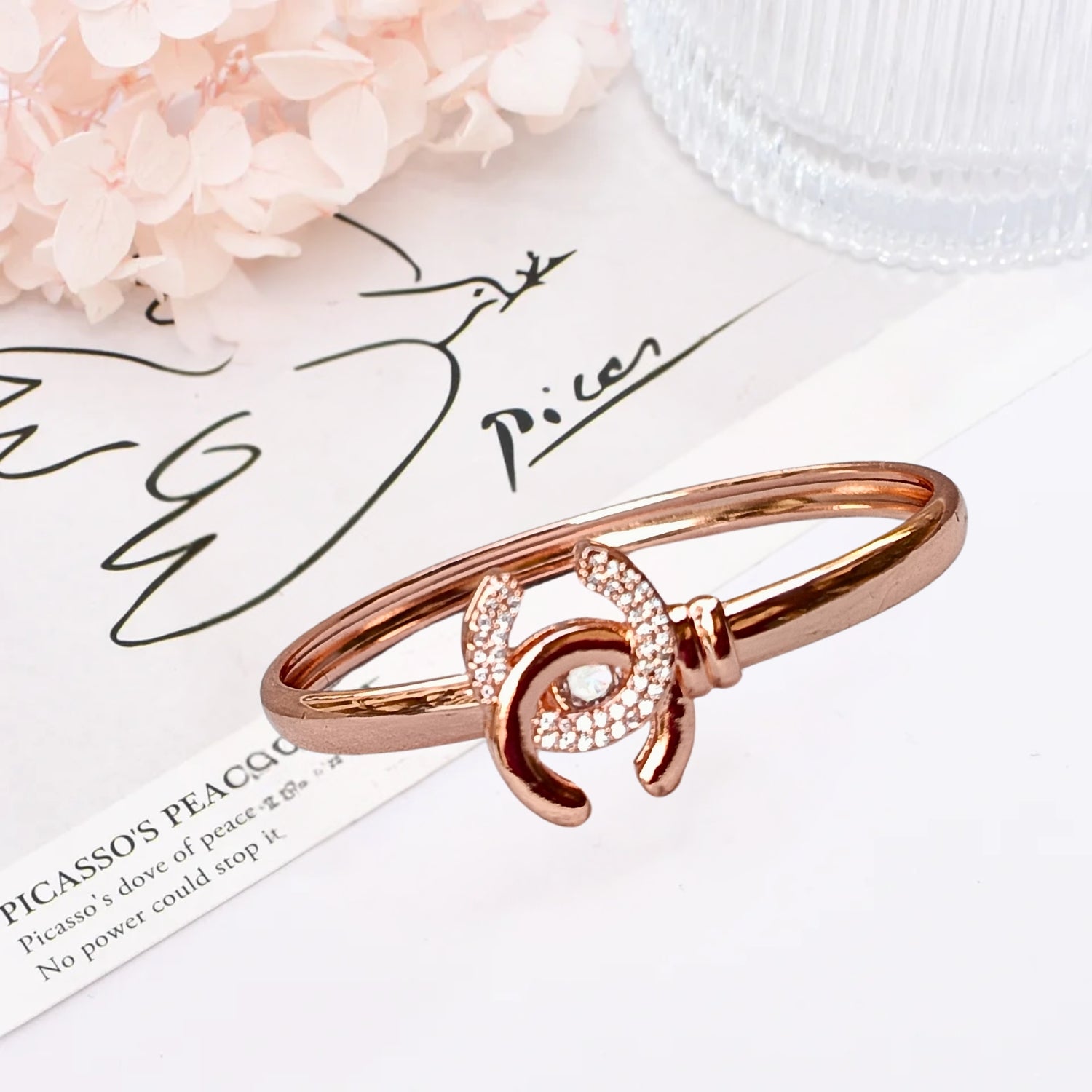 Crystal-embellished bangle bracelets in rose gold finish