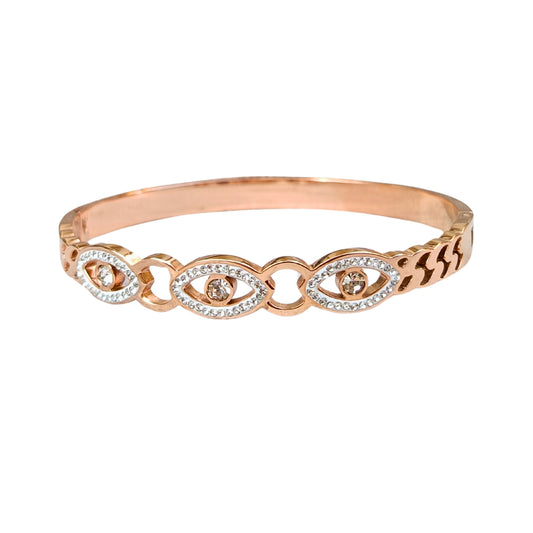 Rose gold evil eye bangle bracelet with intricate crystal detailing, featuring protective eye motifs and a sleek, shimmering finish.